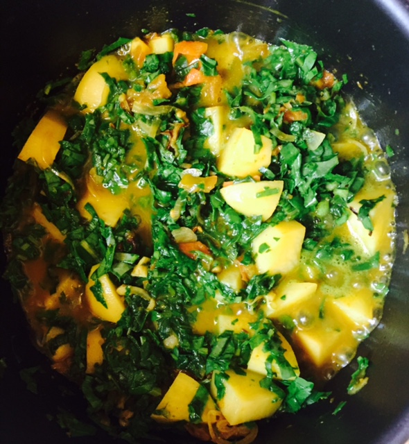Spinach curry with potatoes and fenugreek